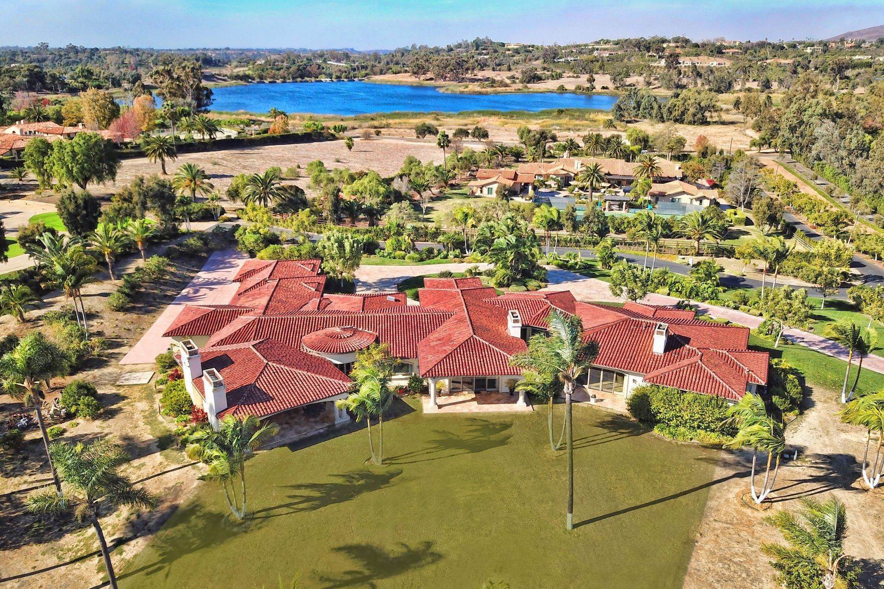 Single Family Homes for Sale at Opulent, Gated Estate with Acres Adjacent to Miles of Equestrian Trails! 6625 Lago Lindo Rancho Santa Fe, California 92067 United States